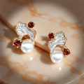 Fiamma – Örhängen i sterlingsilver med flammdesign